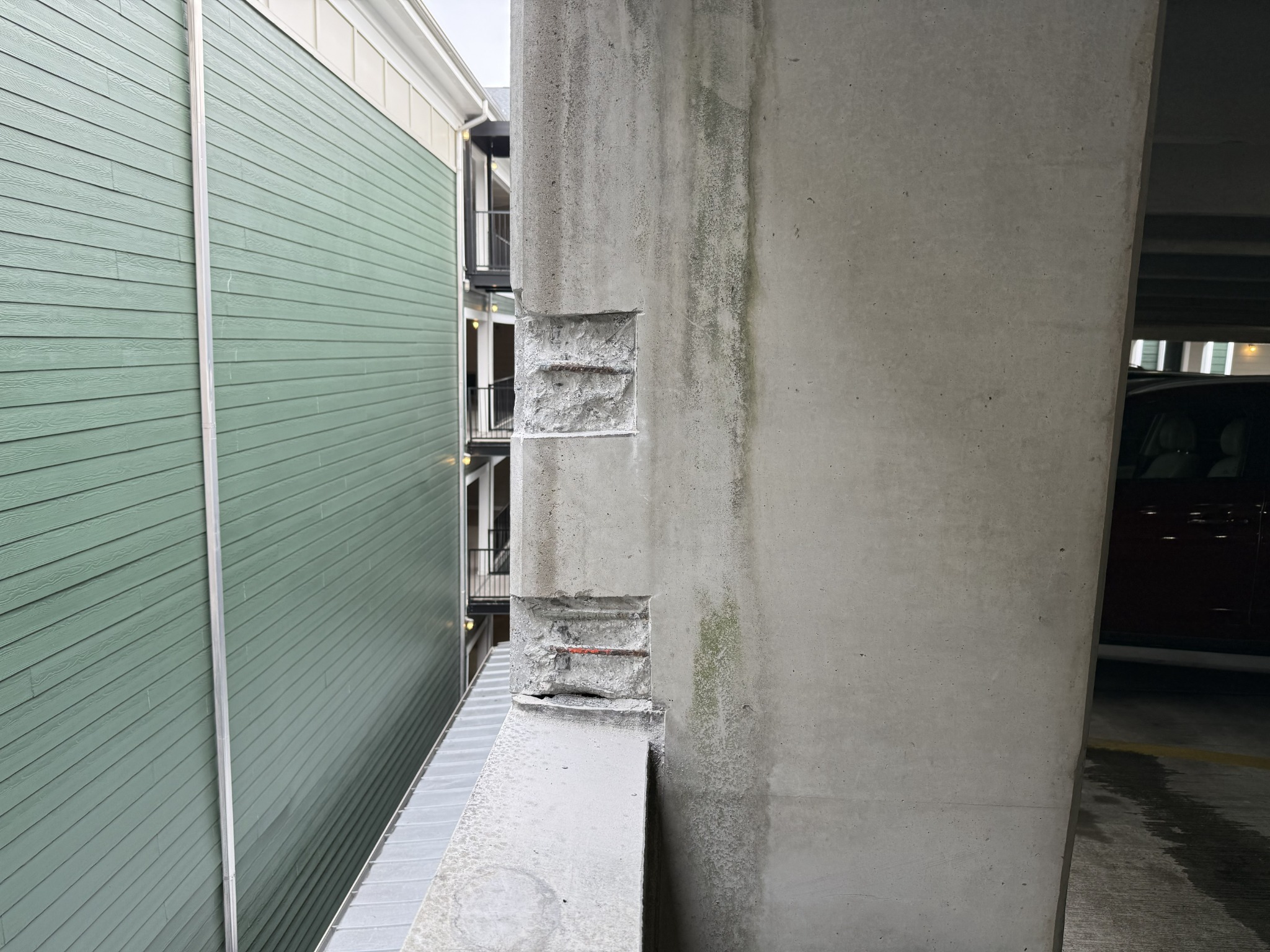 Concrete spall repairs at edge of precast parking garage column