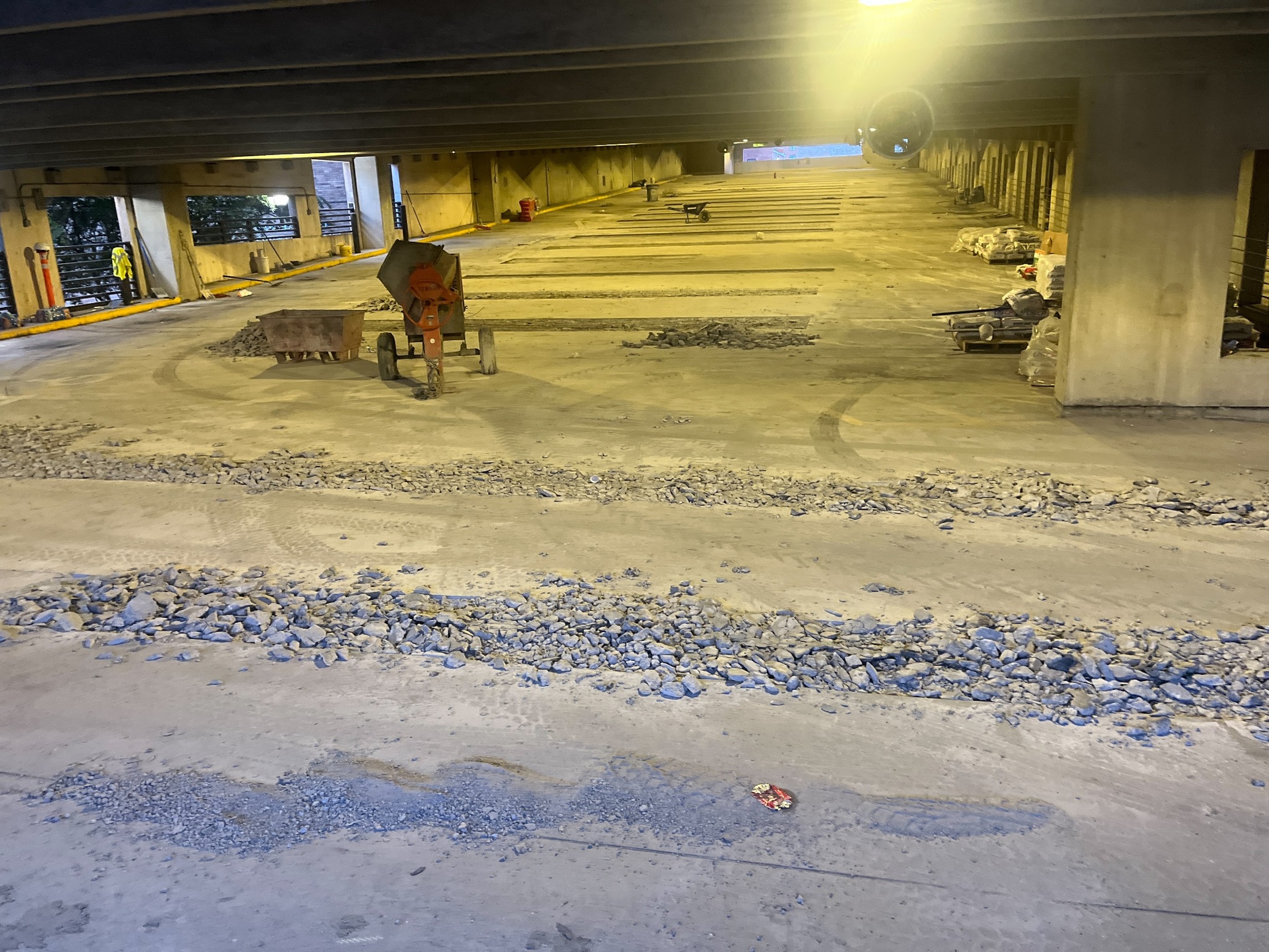 Demolition of deteriorated concrete during New Hanover County parking deck repairs