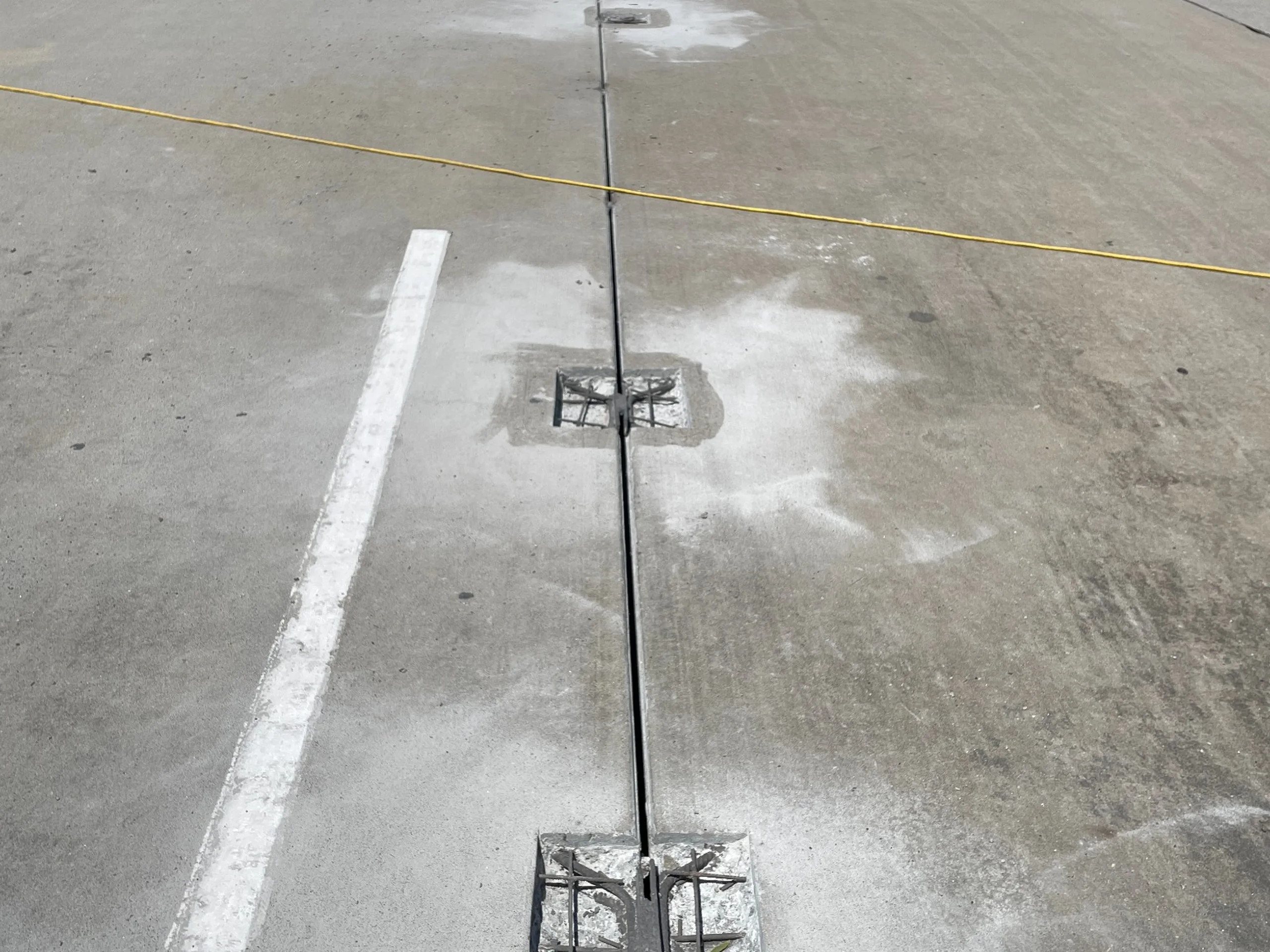 Exposed precast double-tee shear connector repair locations at the Porter Building parking deck